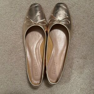 Schutz gold flats